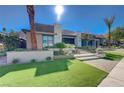 Stunning curb appeal with landscaped yard and modern facade at 10015 Terrastone Dr, Las Vegas, NV 89148