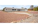 Charming single story home with red rock landscaping at 5085 Raven Ave, Las Vegas, NV 89139