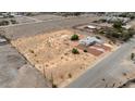 Aerial view of a house with a large lot in a desert setting at 5085 Raven Ave, Las Vegas, NV 89139