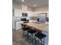 Modern kitchen with stainless steel appliances and an island at 3816 Seyfert Ave, North Las Vegas, NV 89084