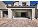 Attached two-car garage with ample space for parking and storage at 9398 Ara Place, Las Vegas, NV 89143