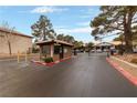 Gated entrance to the community with guard house at 2451 N Rainbow Blvd # 1086, Las Vegas, NV 89108