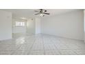 Bright living room with tile floors and ceiling fan at 4323 Ridgedale Ave, Las Vegas, NV 89121