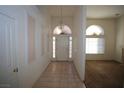 Clean entryway with tiled flooring and views to living room at 3134 Alfa Romero Ave, North Las Vegas, NV 89031