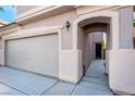 Attached garage with walkway to front entry at 9163 Denver Sky Ave, Las Vegas, NV 89149