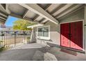 Inviting entryway with red double doors and a covered patio at 5132 Spencer St, Las Vegas, NV 89119