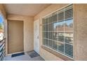 Condo entry with door and window at 9070 Spring Mountain Rd # 216, Las Vegas, NV 89117