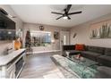 Bright living room featuring a comfy sectional sofa and a modern fireplace at 3368 Epson St, Las Vegas, NV 89129