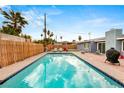 Inviting backyard pool with ample patio space for lounging at 1707 S 8Th St, Las Vegas, NV 89104