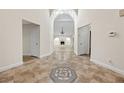 Elegant entryway with tiled floors and a decorative medallion at 3742 Mcleod Dr, Las Vegas, NV 89121