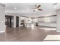 Bright living room with hardwood floors and open layout at 8797 Pinley Spring St, Las Vegas, NV 89113