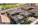 Aerial view of house and neighborhood, showcasing backyard pool at 2900 Foxtail Creek Ave, Henderson, NV 89052