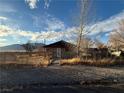 Front view of a stone house with a gate at 51 North 3Rd St, Ely, NV 89318