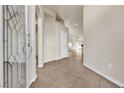 Bright and spacious entry hall with tile flooring at 11605 Cabo Del Sol Ct, Las Vegas, NV 89138