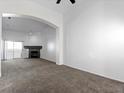 Living room with fireplace and access to balcony at 8725 W Flamingo Rd # 235, Las Vegas, NV 89147