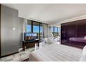 Spacious bedroom with city views and a large bed at 4381 W Flamingo Rd # 2022, Las Vegas, NV 89103