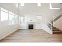 Spacious living room with high ceilings and hardwood flooring at 1227 La Ballena Trl, Henderson, NV 89074