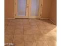 Spacious living room with tile flooring and access to a patio at 1440 Vegas Valley Dr # 7, Las Vegas, NV 89169