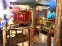 Pirate-themed game room with ship decor and multiple seating areas at 501 Sam Jonas Dr, Las Vegas, NV 89145