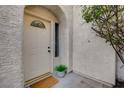 Front entrance with a decorative glass window at 352 Dockside Ct, Las Vegas, NV 89145