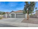 Two-car garage and front yard of single-story house at 673 Kentons Run Ave, Henderson, NV 89052