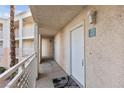 Building hallway with white doors and neutral walls at 5000 Red Rock St # 217, Las Vegas, NV 89118