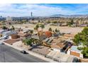 Aerial view showcasing a single-story home with a large backyard and neighborhood context at 5367 Tamarus St, Las Vegas, NV 89119