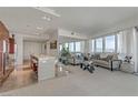 Open living area with city views and modern furniture at 4471 Dean Martin Dr # 2000, Las Vegas, NV 89103