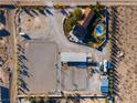 Aerial view showcasing house, pool, and expansive property at 9350 Homestead Rd, Las Vegas, NV 89143