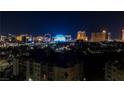 Night view of the city skyline, high rise buildings, and a Ferris wheel at 730 S Royal Crest Cir # 421, Las Vegas, NV 89169