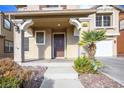 Front entrance with stairs leading to a covered porch at 954 Ashford Hollow Ave, Henderson, NV 89012