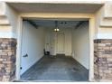 Spacious single car garage with interior access door at 6624 Lavender Lilly Ln # 1, North Las Vegas, NV 89084