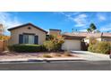 Single-story home with attached garage and well-maintained landscaping at 10701 La Crescenta Ct, Las Vegas, NV 89141