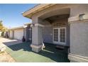 Front entry with double doors and a covered porch at 4861 Stoneham St, Pahrump, NV 89061