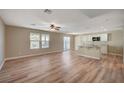 Open concept kitchen with island, granite countertops, and light cabinets at 3232 Pasolini Ct, North Las Vegas, NV 89032