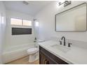 Renovated bathroom with soaking tub, modern vanity, and updated fixtures at 835 Cherry Dr, Henderson, NV 89002