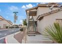 Exterior staircase leading to an apartment building entrance at 7804 Snowden Ln # 201, Las Vegas, NV 89128