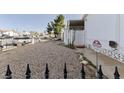 Gravel yard with a fence and no trespassing sign at 209 Mohawk Dr, Henderson, NV 89015