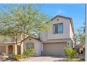 Two-story house with attached garage and landscaping at 2970 Gunnery Forge St, Las Vegas, NV 89156