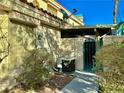 The side yard features a walkway, AC unit, and gated access at 1024 Sun Wood Dr, Las Vegas, NV 89145