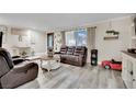 Living room with hardwood floors and a view of the front entrance at 3358 China Dr, Las Vegas, NV 89121