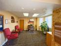 Community lobby with comfortable seating and work area at 555 Highland Dr # 221, Mesquite, NV 89027