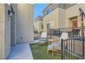 Small patio with seating area located outside of a townhome at 2843 Kona Blue Ln # 5, Las Vegas, NV 89183