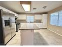 Kitchen with stainless steel appliances and granite countertops at 3667 Spring Willow Ct, Las Vegas, NV 89147