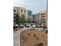 Apartment building with parking and landscaping at 50 E Serene Ave # 207, Las Vegas, NV 89123