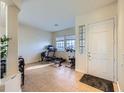 Bright home gym with a treadmill, rowing machine, and exercise bike at 7200 Rustic Meadow St, Las Vegas, NV 89131