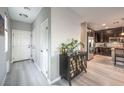 Light and airy entryway with view into kitchen at 6482 Twin Harbors Ct, Las Vegas, NV 89141