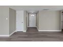 Welcoming entryway with gray wood-look flooring and access to a closet at 4425 Stacey Ave, Las Vegas, NV 89108