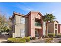 Two-story building with Spanish style architecture and landscaping at 8000 W Badura Ave # 1129, Las Vegas, NV 89113