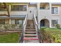 Front entrance with stairs leading to a condo unit at 1402 Santa Margarita St # H, Las Vegas, NV 89146